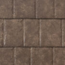 {Closeup image showing the details of ProVia's Lodgestone brown colored metal slate roofing }