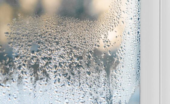 Closeup image showing condensation on window glass