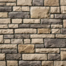 Closeup detail of Amherst limestone veneer with Brown grout