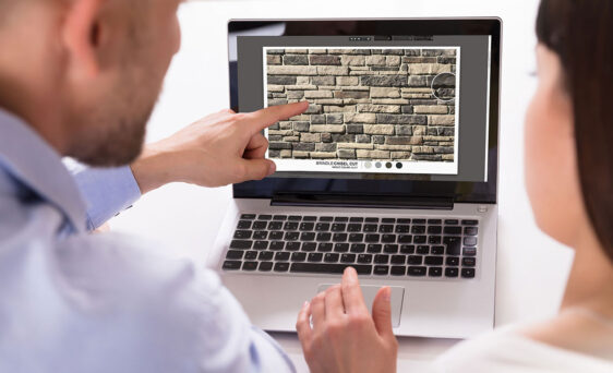 {Couple using the stone and grout visualizer on a laptop}