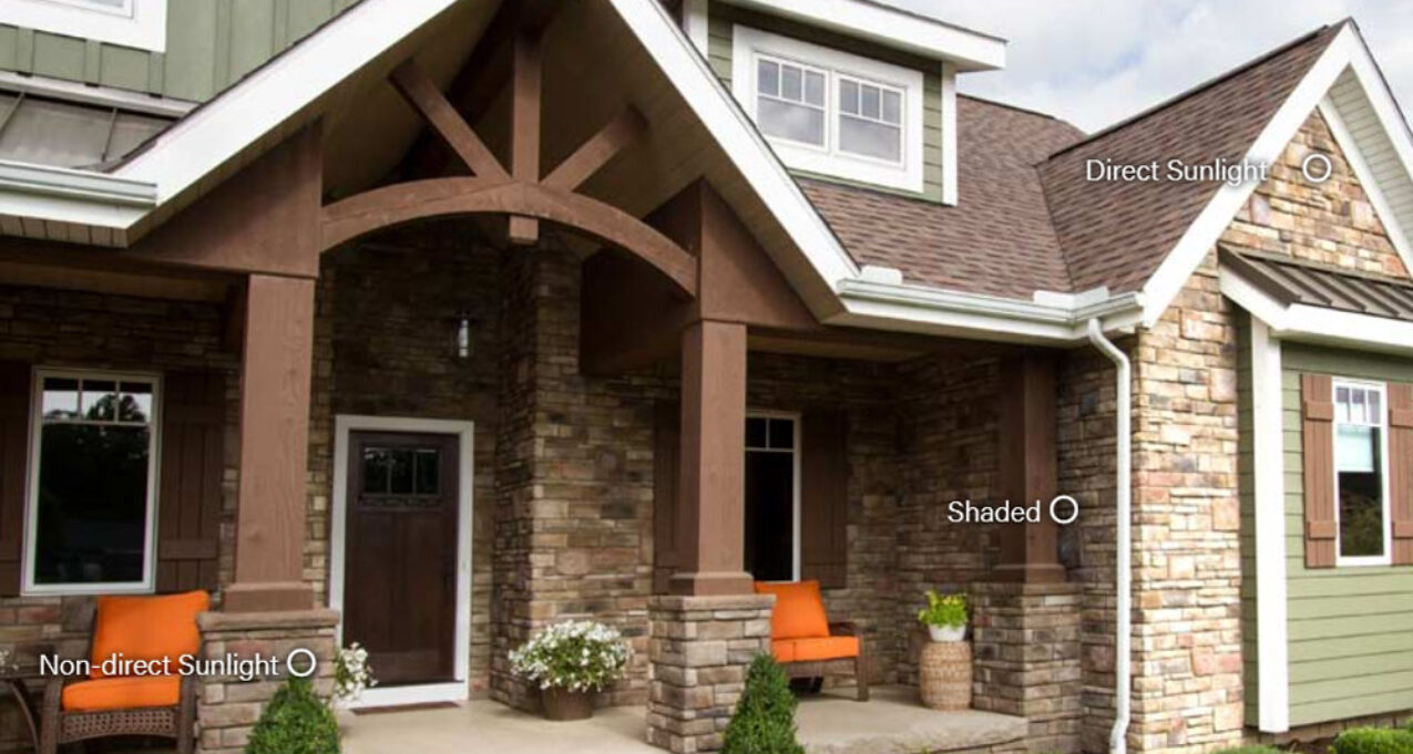 {Image of a home with stone veneer demonstrating how outdoor lighting conditions affects stone color}