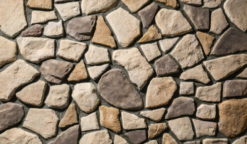 Brown and tan Fieldstone veneer with brown grout, Top Rock