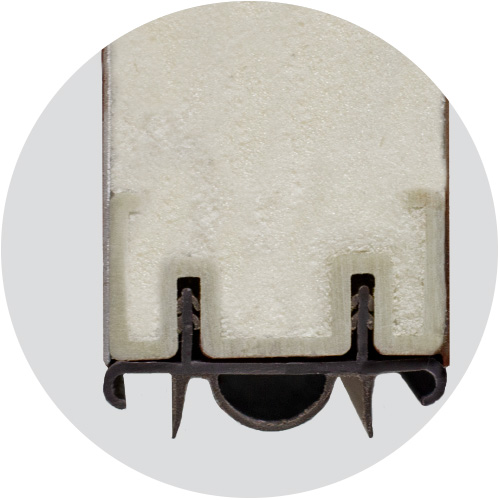 Detailed photograph of a bulb and blade sweep on one of ProVia's prehung exterior doors