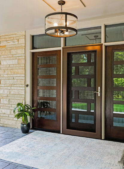 A ProVia Deluxe™ Full View 397 Storm Door in Tudor Brown on a modern-style home