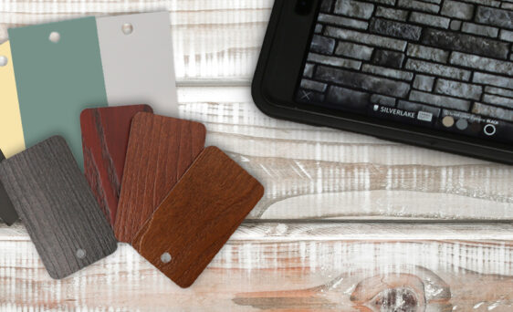 {ProVia color samples on a wooden surface showing ideas that can be put together for house color schemes}