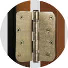 {Detailed photograph of hinges on a ProVia pre-hung exterior door}