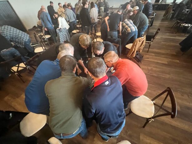 {At a recent Leadership Summit, ProVia leaders worked together in groups on a team-building exercise.}