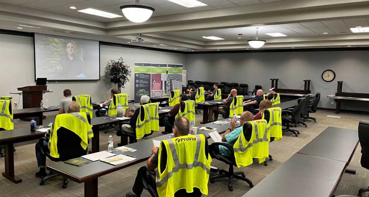 {Image of new ProVia hires in a conference room as they complete their onboarding training}
