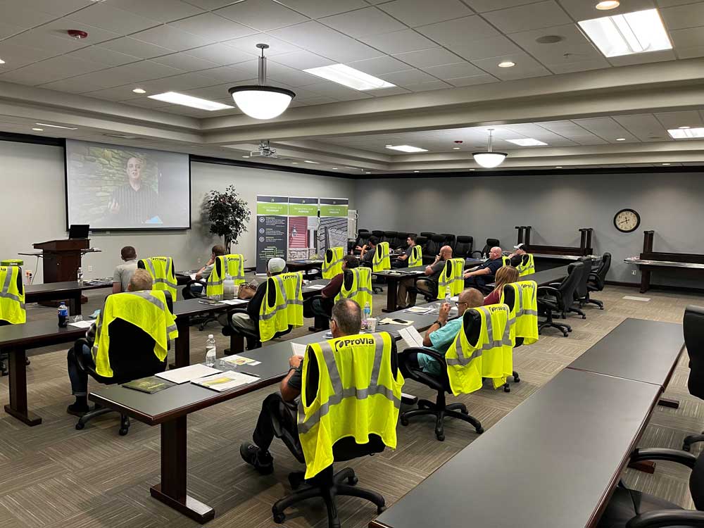 Image of new ProVia hires in a conference room as they complete their onboarding training