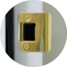 {Detailed photograph of a strike plate on a ProVia pre-hung exterior door}