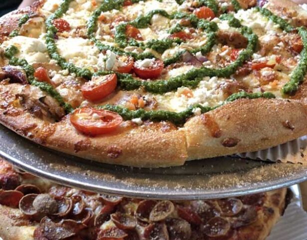 {ProVia's Corporate Relations team enjoys Park Street Pizza together to foster a strong team culture}