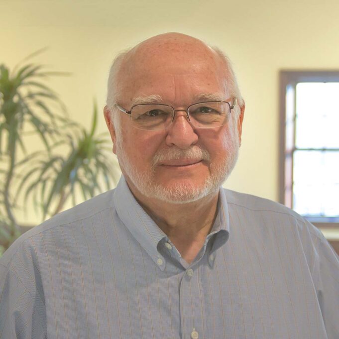 {Professional photo of Bill Mullet, who founded ProVia in Sugarcreek, OH in 1977 and announced his retirement in 2015}