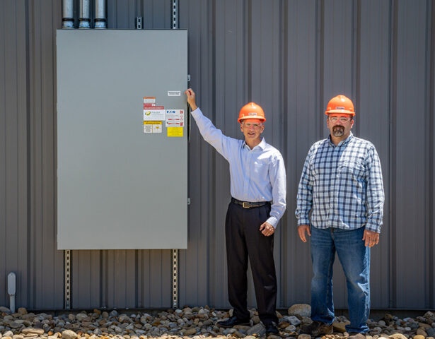 {ProVia's Brian Miller (President & CEO) and Steve Ice (Director of Manufacturing) flip the switch to power up the new solar array.}