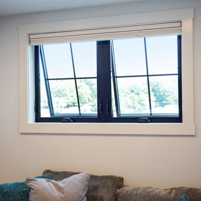 {Inside view of ProVia's Endure awning windows in Textured Matte Coal Black with internal grids}