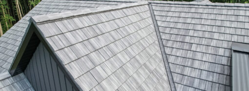{Home with ProVia's gray Shadewood Shake metal shingle roof showing that metal roofing can resemble the look of shake shingles}
