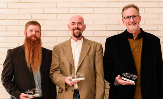 {ProVia truck drivers Chris Yoder, Jeff Schlabach, and Tim Gingerich pose with awards as they were inducted into the Million Mile Club}