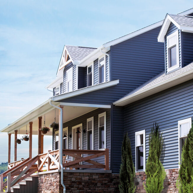 {ProVia Cedar Peaks® Double 4.5" dark blue Vinyl Siding in Sea Slate}