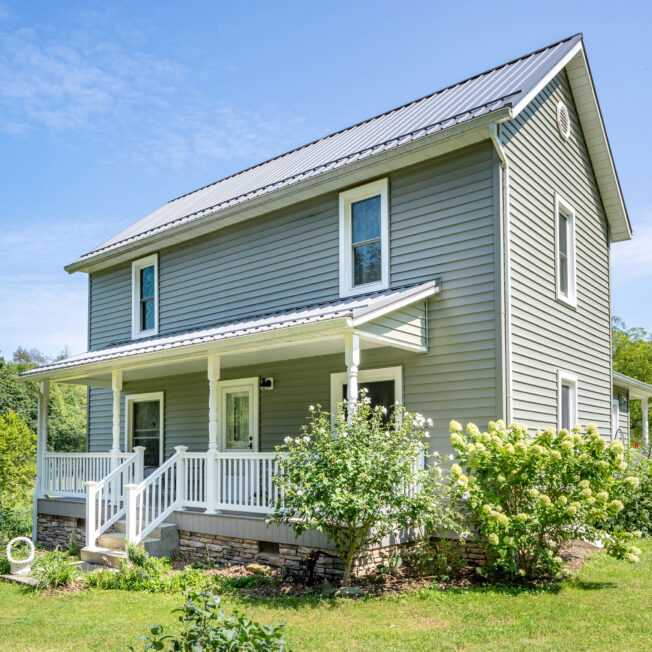 {ProVia HeartTech® Vinyl Siding in green Aspen}