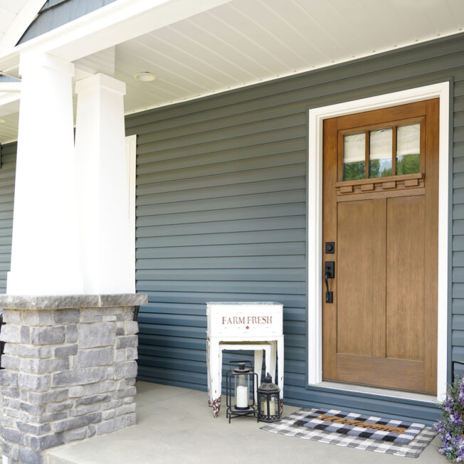 {ProVia HeartTech® Double 4" Dutch Lap blue vinyl siding in Nautica}