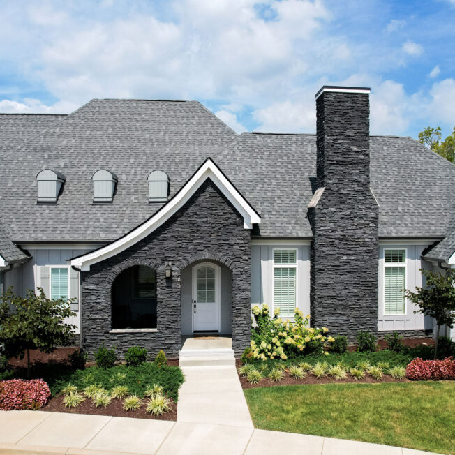 {ProVia PrecisionFit™ Sage Gray manufactured stone on home exterior}