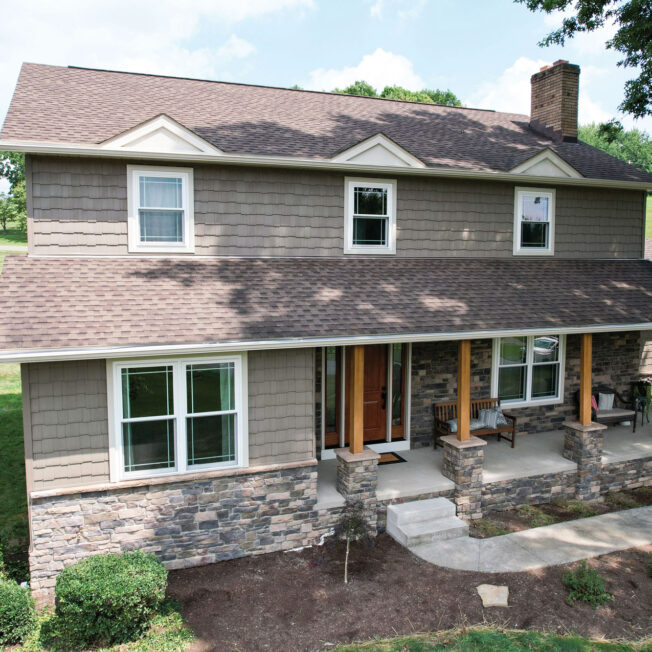 {ProVia Harbor Mill™ Staggered Shake in Pueblo with Terra Cut™ Niagara Manufactured Stone}