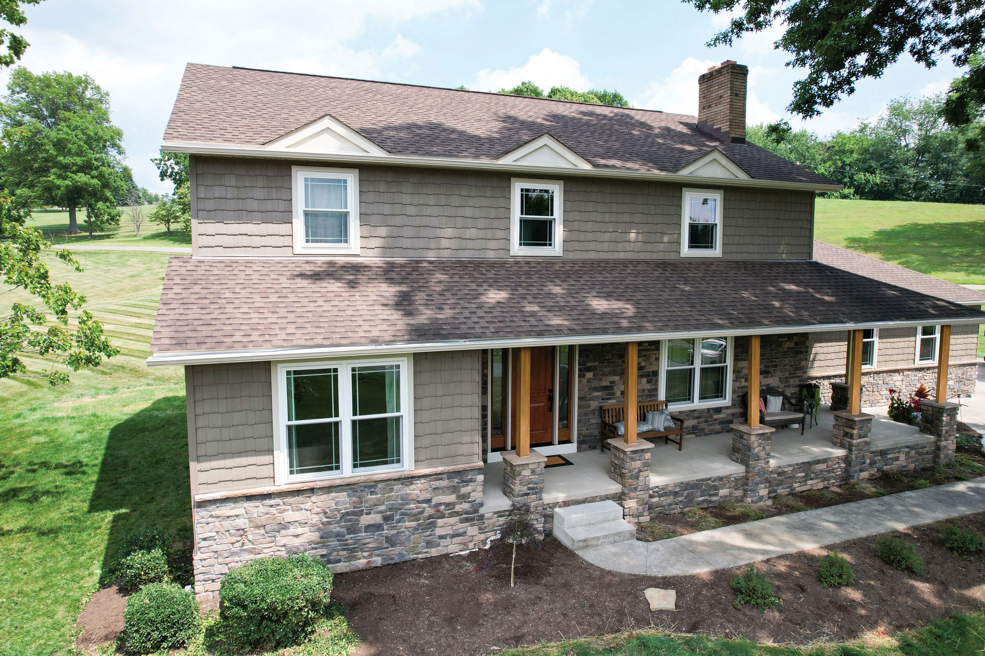 ProVia Harbor Mill™ Staggered Shake in Pueblo with Terra Cut™ Niagara Manufactured Stone