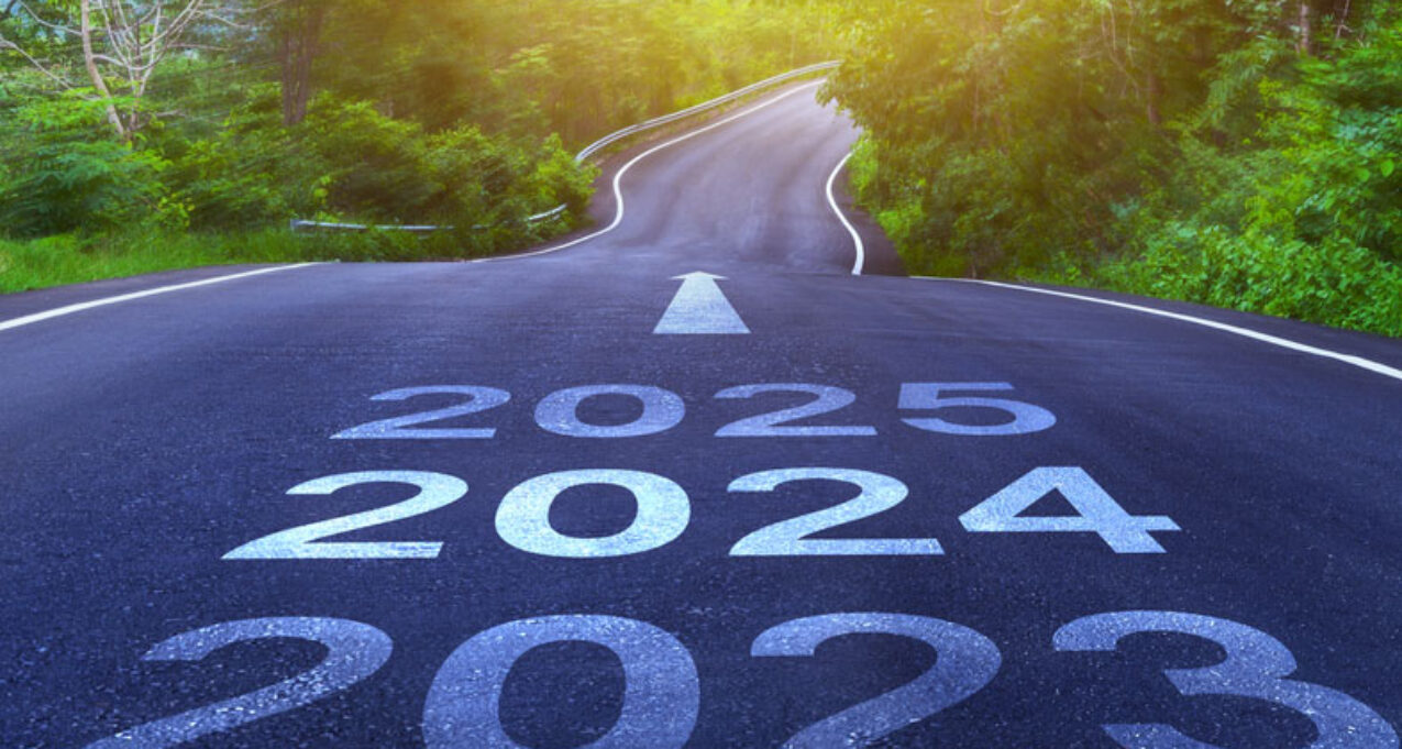 {Stock photo of a road illustrating looking ahead from 2024 to 2025 and beyond}