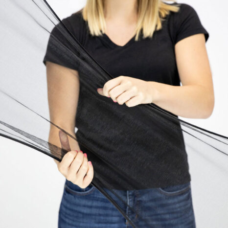 Closeup image of a woman holding FlexScreen in her hands