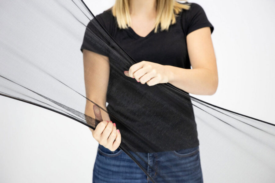 Closeup image of a woman holding FlexScreen in her hands