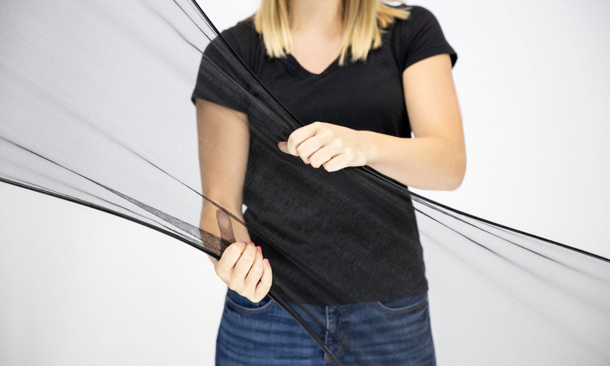Closeup image of a woman holding FlexScreen in her hands