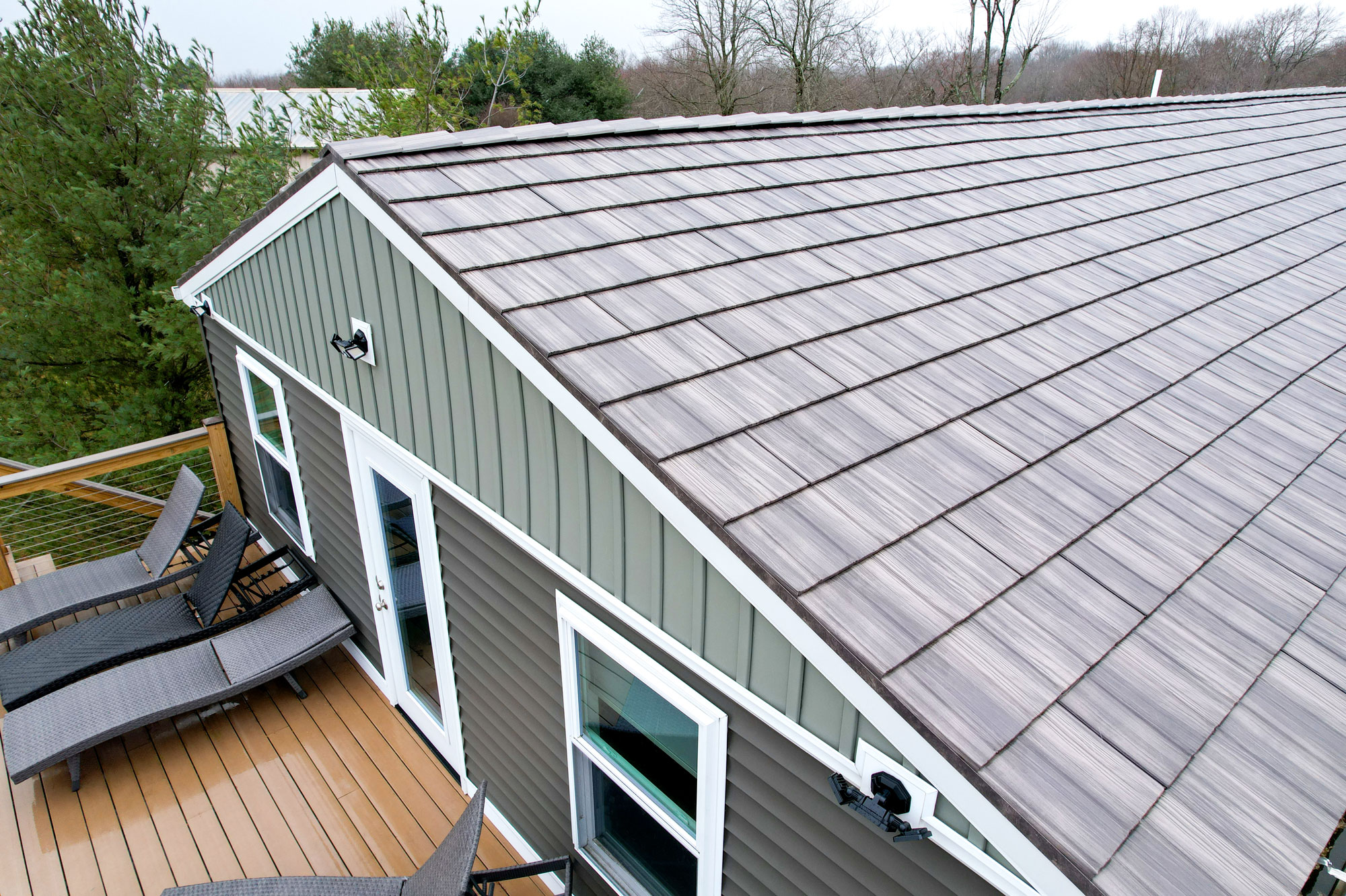 Aerial photo of ProVia shake metal roofing in a light gray color called Pepperwood