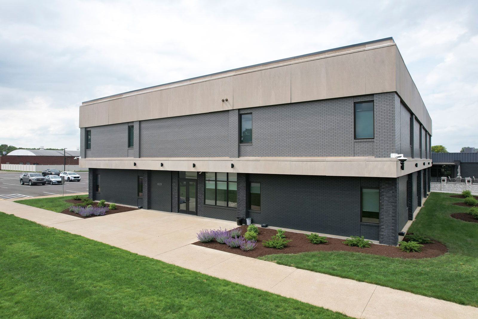 Exterior view of the entrance of the ProVia® New Philadelphia Facility, where window and patio door profile lamination is produced