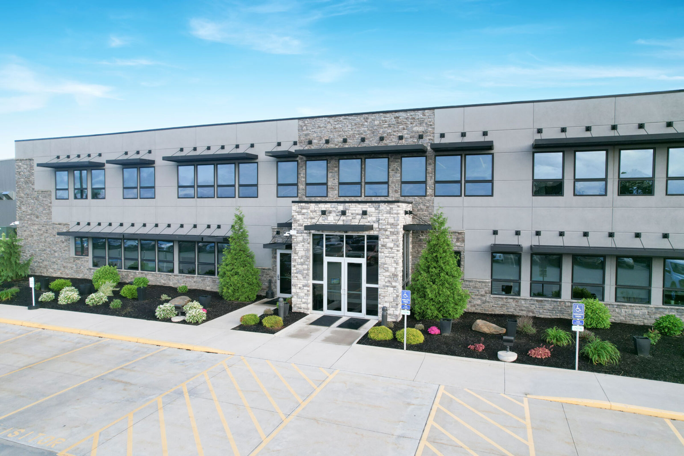 {Exterior view of the entrance of the ProVia® Strasburg Window Production and Distribution Facility}