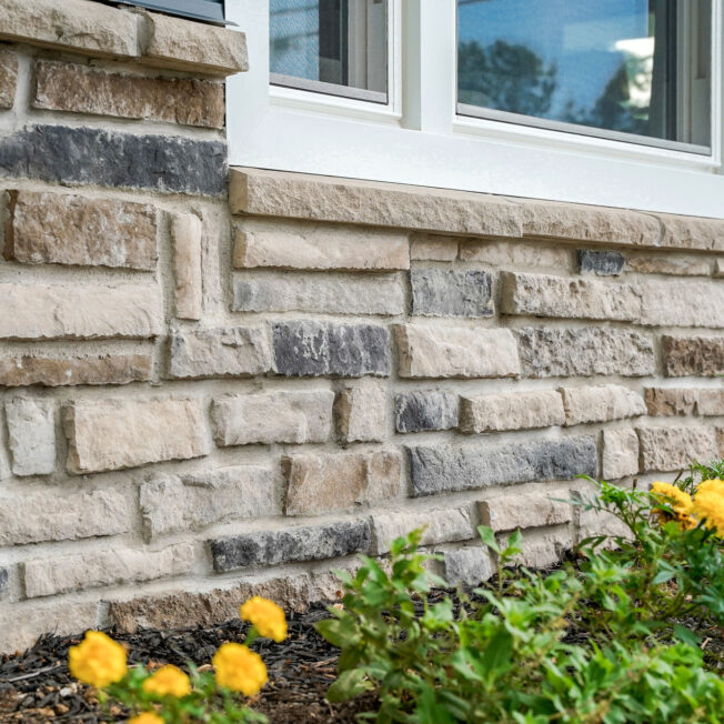 {Chisel Cut™ Manufactured Stone Knee Wall in the color Wellington}