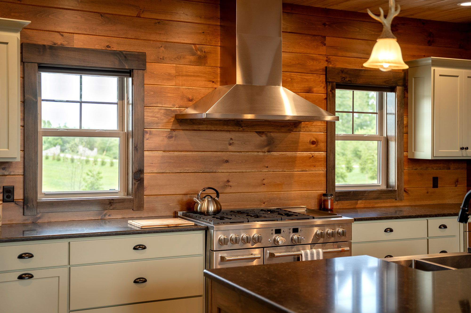 Endure™ Double Hung Windows in Sandstone with Cottage Grids Interior