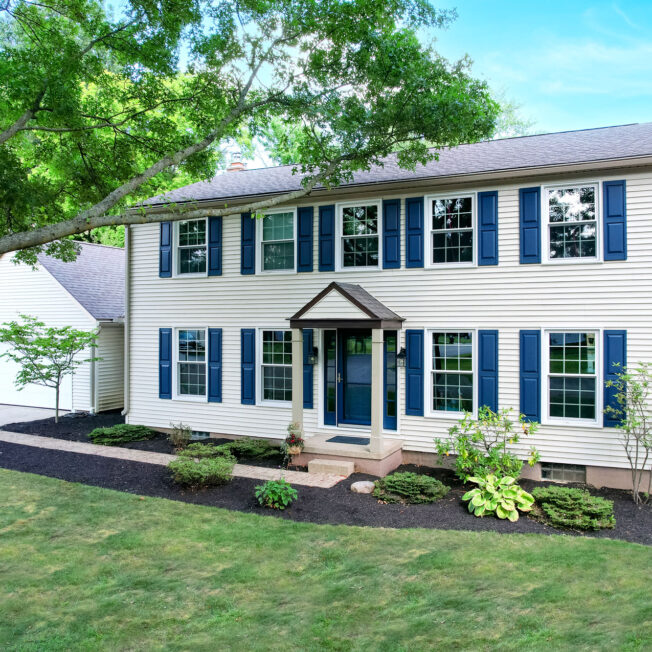 {ProVia Endure™ Double Hung white Windows on a Colonial-style home}