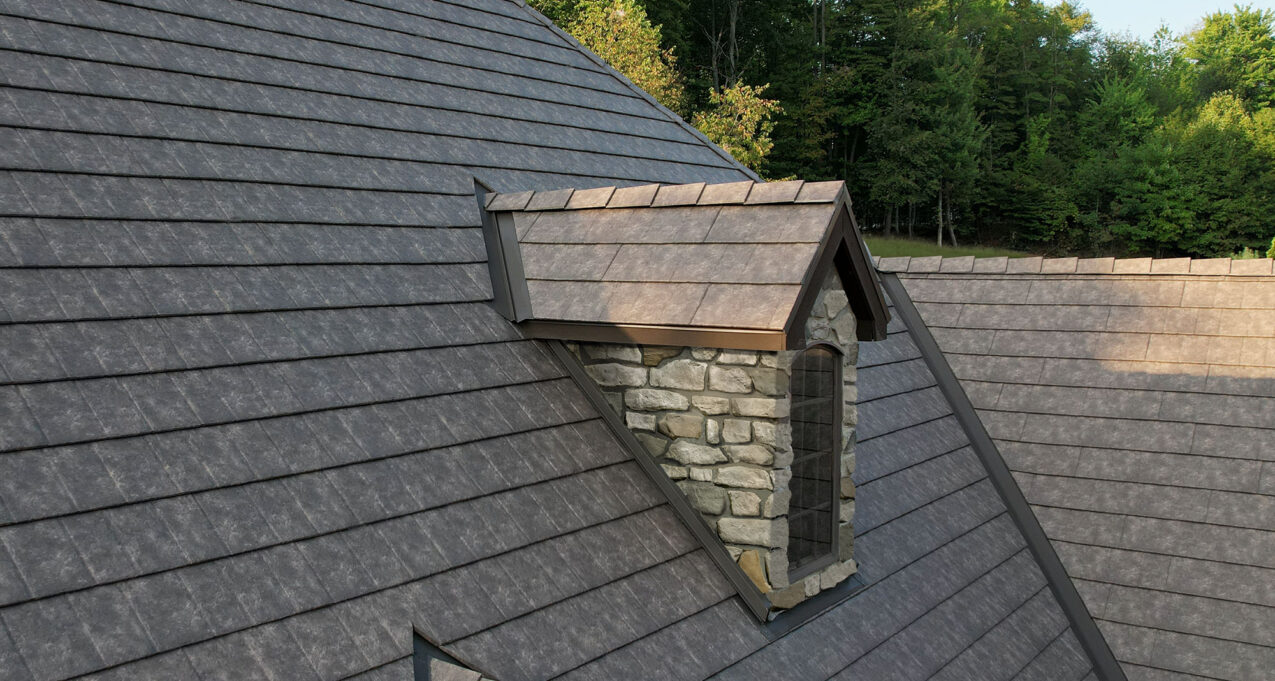 {Closeup of ProVia Lodgestone Slate Metal Roofing on a home}