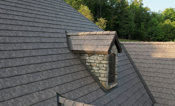 {Closeup of ProVia Lodgestone Slate Metal Roofing on a home}