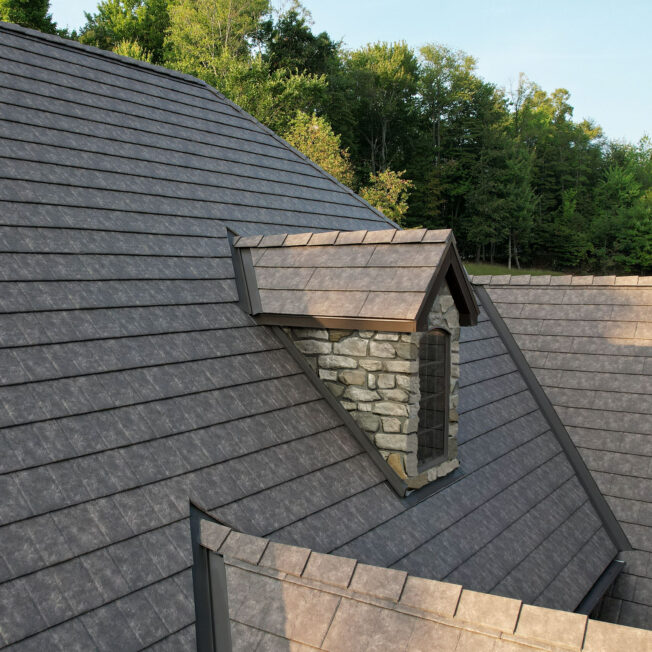 {Closeup of ProVia Lodgestone Slate Metal Roofing on a home}