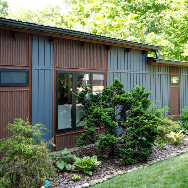 {ProVia® CedarMAX® Board and Batten siding in Sea Slate on a modern style home}