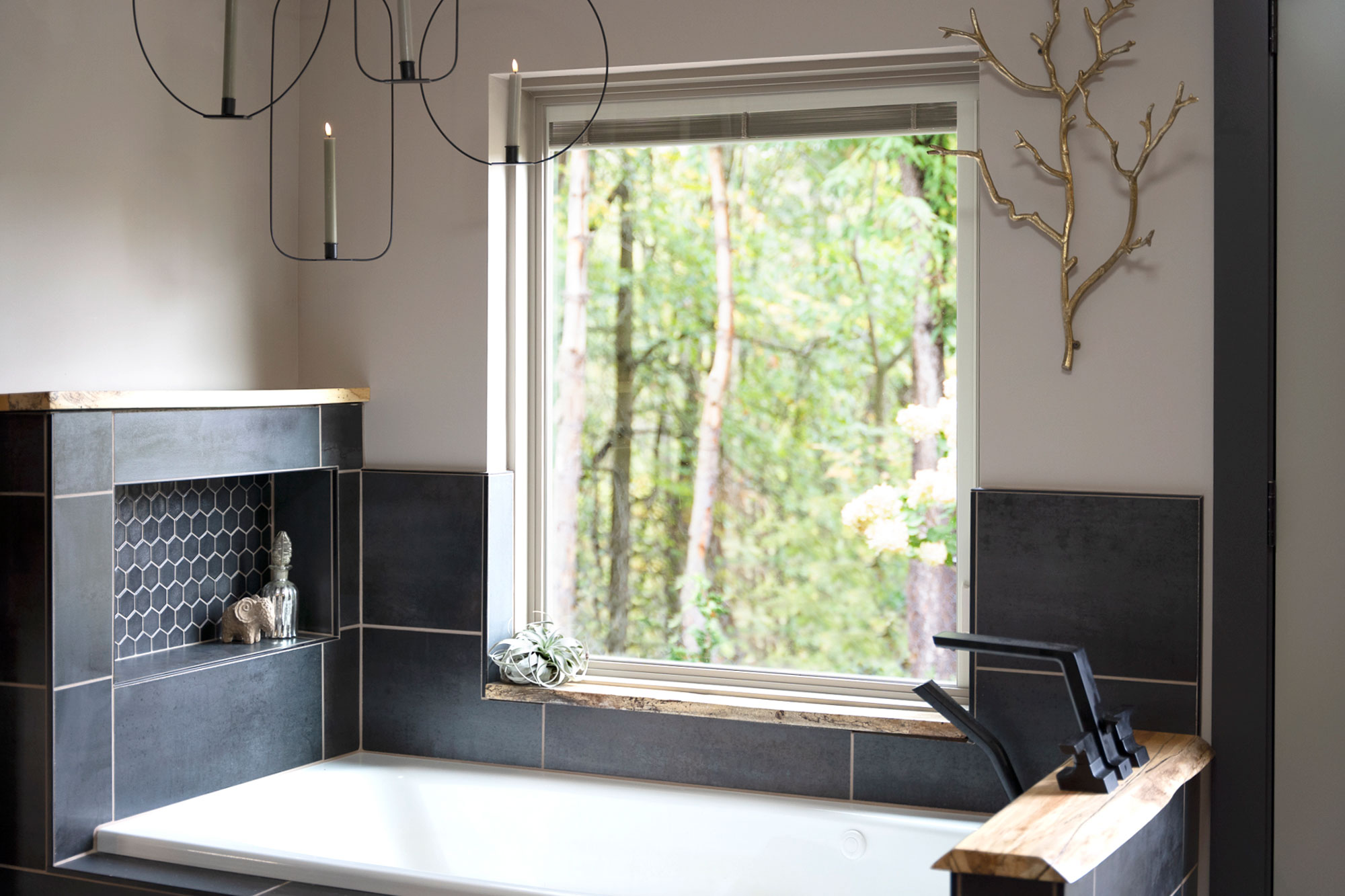 Interior view of a ProVia® Endure™ Picture Window in White Woodgrain Laminate above a garden tub