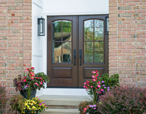 {Exterior view of ProVia Signet® Cherry 449 French Doors in Hazelnut with Simulated Divided Lites}