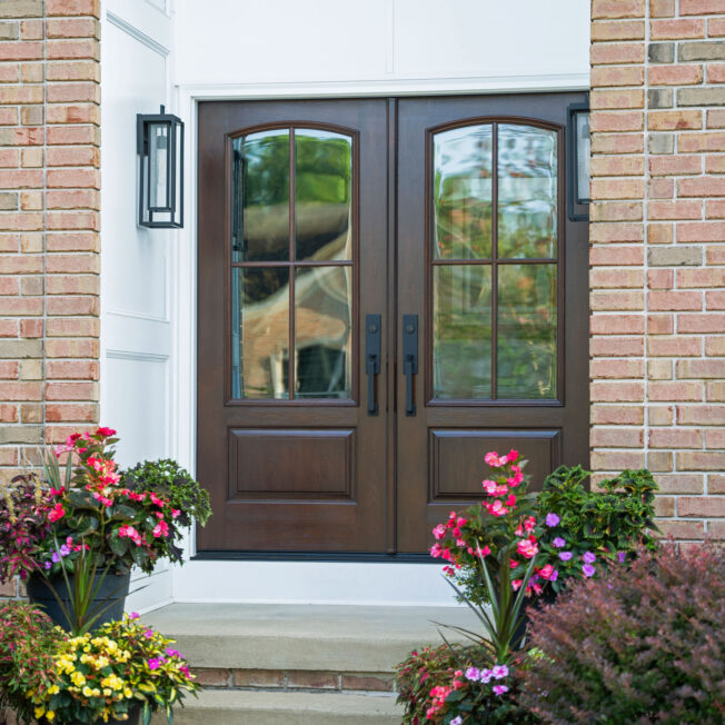{Exterior view of ProVia Signet® Cherry 449 French Doors in Hazelnut with Simulated Divided Lites}