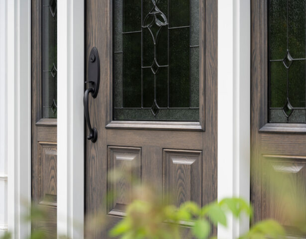 {Closeup of a ProVia® Signet® Oak 440-2P in Urban Barnwood with Esmond Decorative Glass}