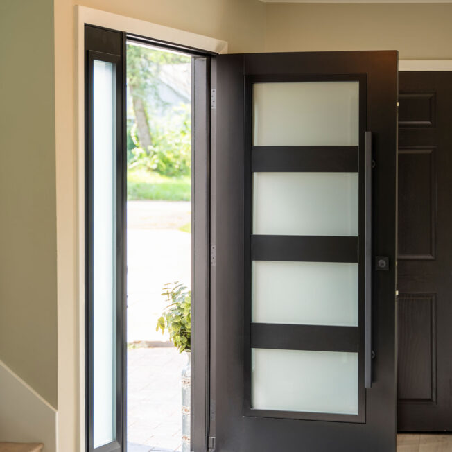 {Interior view of a ProVia® Signet® Fir 460-T5-4L entry door in Coal Black with Frosted Privacy Glass}