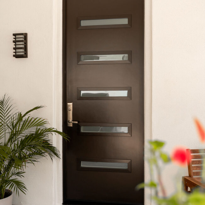 {Exterior image of a ProVia® Signet® Smooth 115 8-Foot Door in Rustic Bronze Paint with Frosted Privacy Glass}