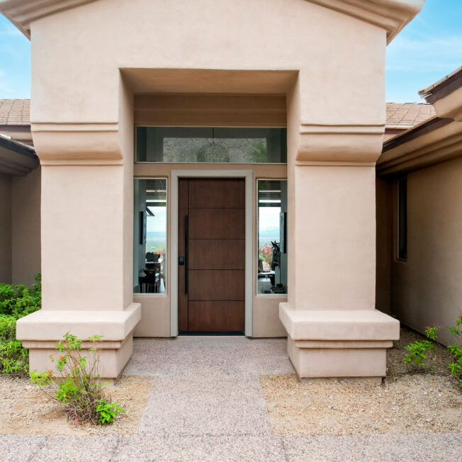 Exterior view of a ProVia® Signet® Cherry 001 8' 42" Wide front door in Nutmeg with Emtek® Square Pull Bar in Black