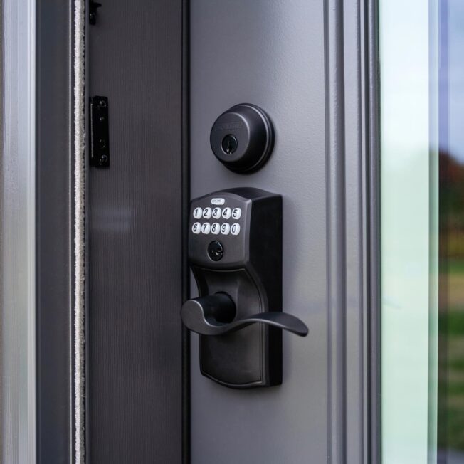 Schlage® Electronic Keypad Deadbolt in Black on a Nightfall dark gray ProVia® entry door