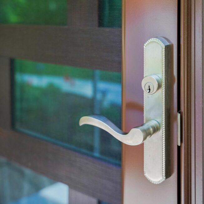 Mortise Multi-Point Sierra Storm Door Hardware in Satin Nickel on a ProVia® Tudor Brown storm door