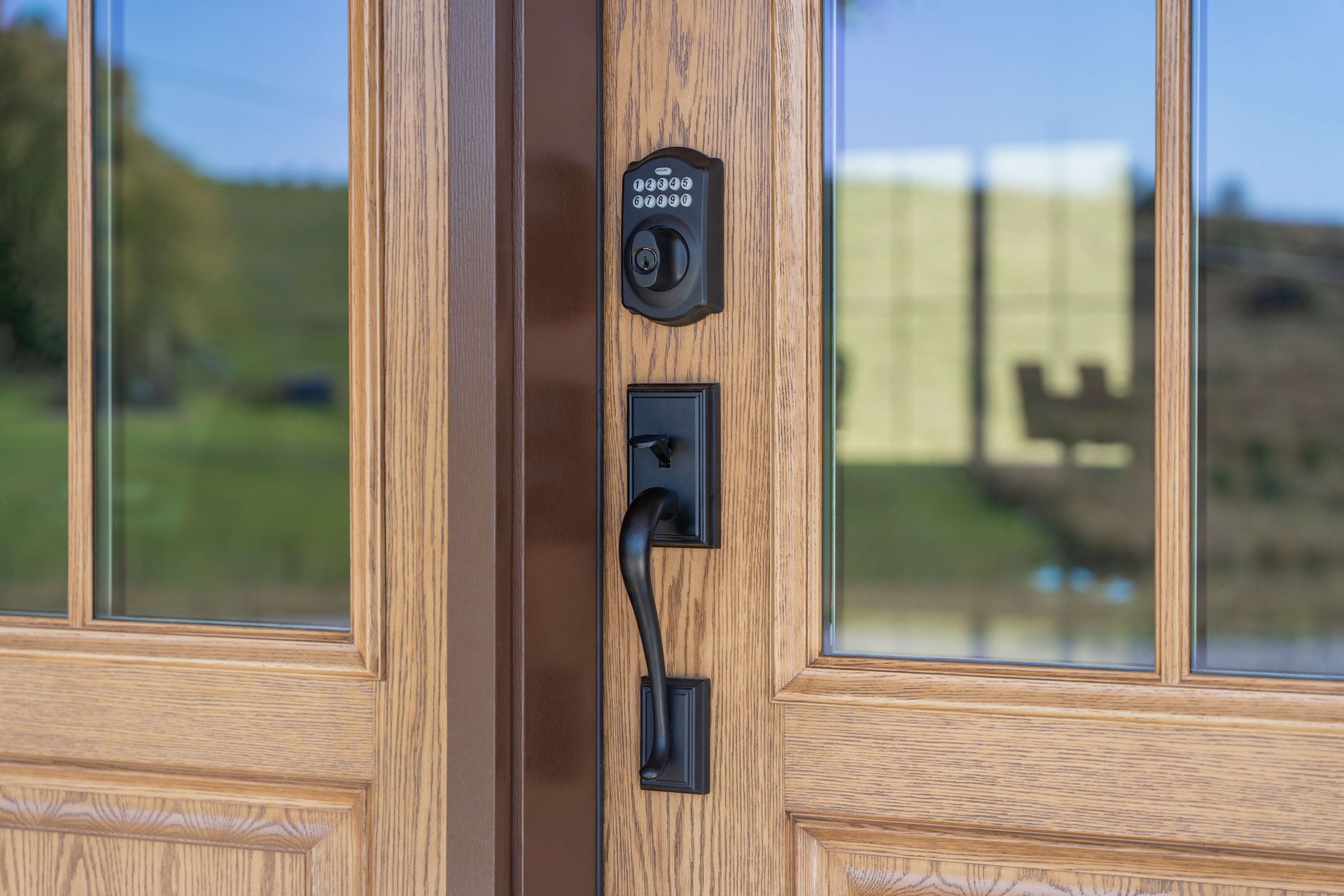 Schlage® Addison Entry Door Hardware with Electronic Keypad Deadbolt in Black